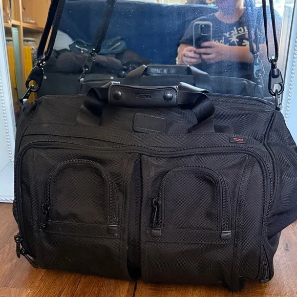 Tumi black travel bag/carryon